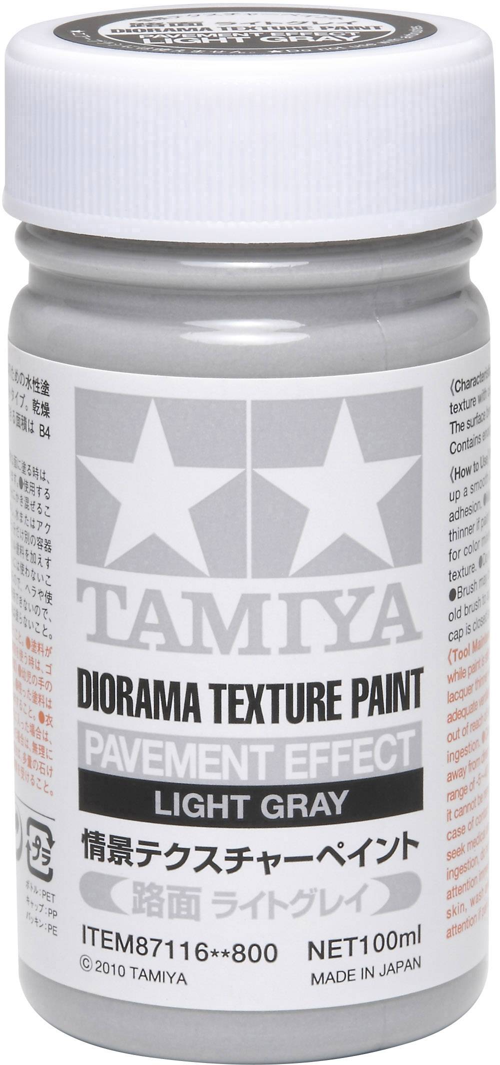 The image shows a 100 ml bottle of Tamiya Diorama Texture Paint in Light Grey. Label reads: 'Pavement Effect'. Made in Japan.