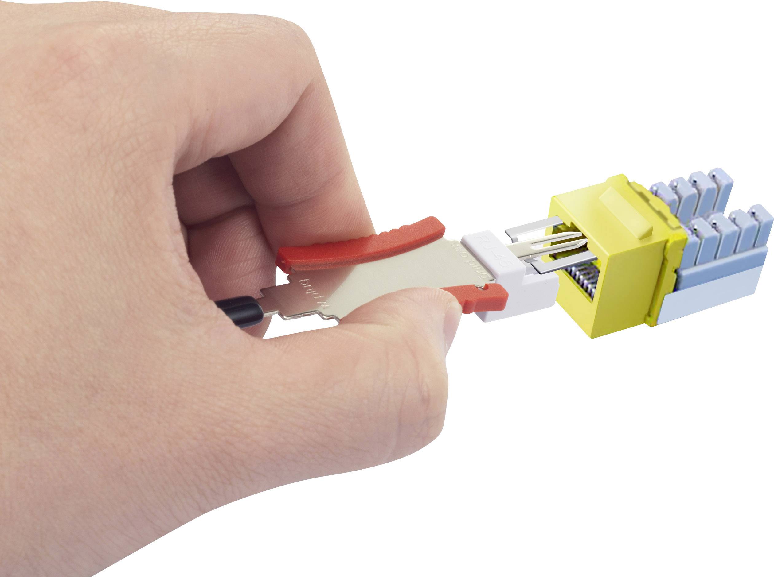 A hand holds a fibre optic connector being plugged into a yellow network socket. It represents a network connection.