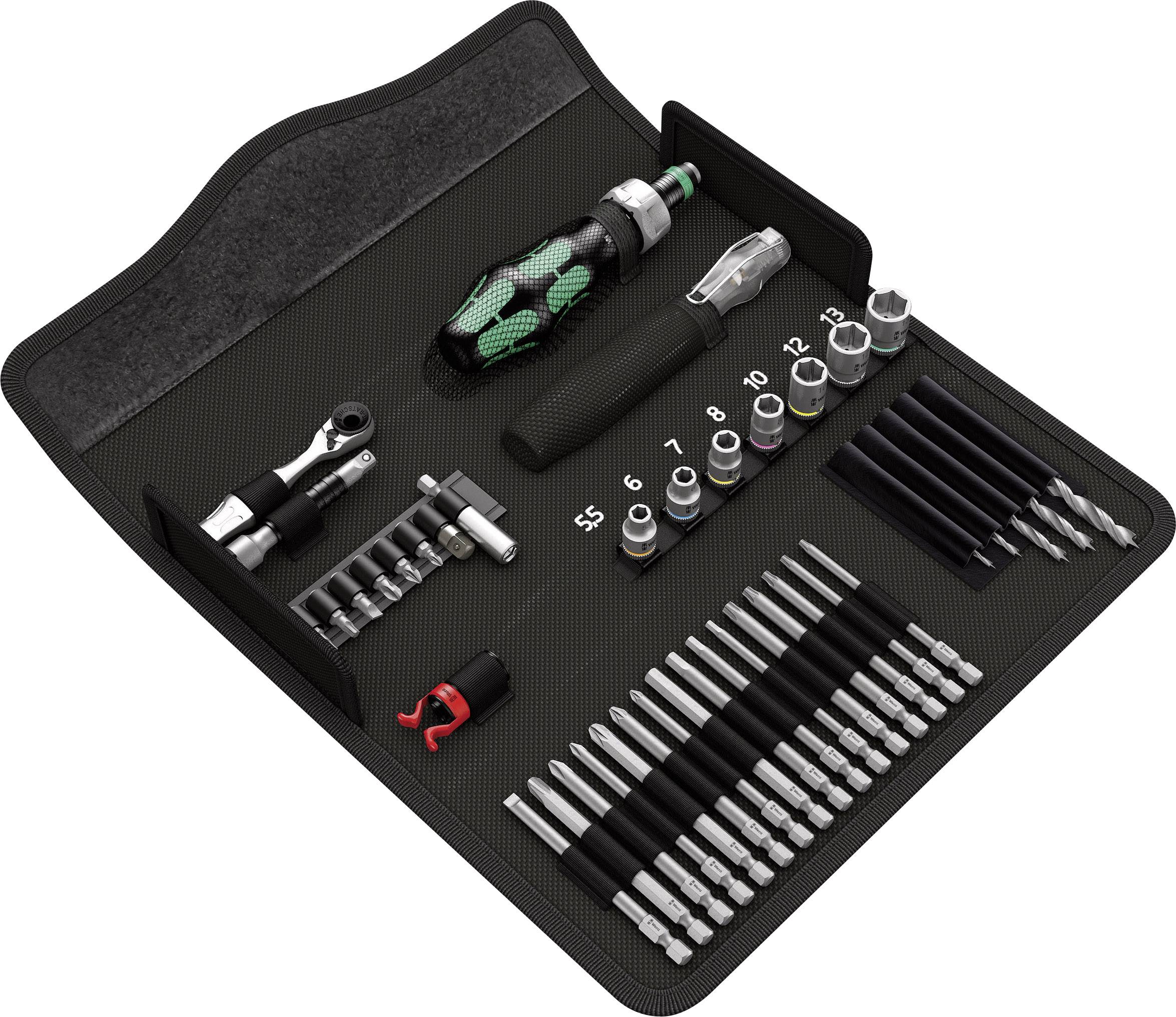 A tool set with screwdrivers, bits and nuts arranged neatly on a black mat.