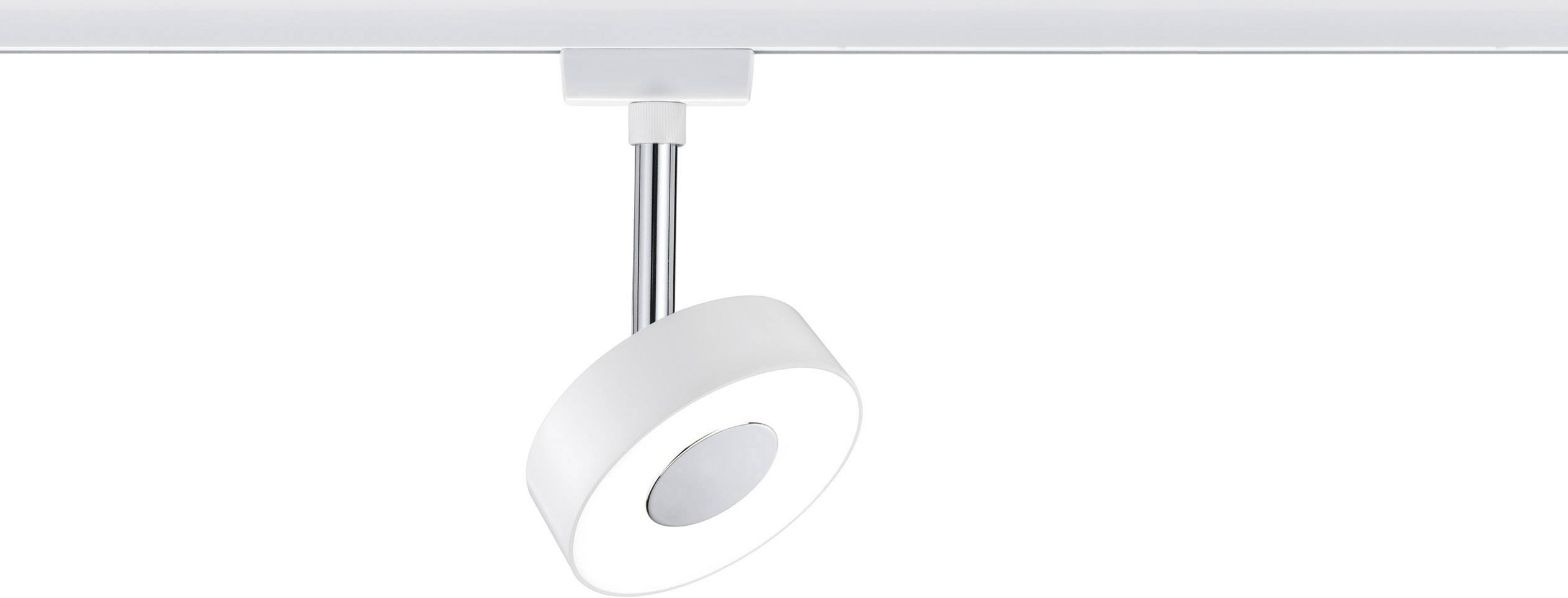 Single round LED spotlight in white, mounted on a track and suspended from the ceiling, serves for targeted illumination.