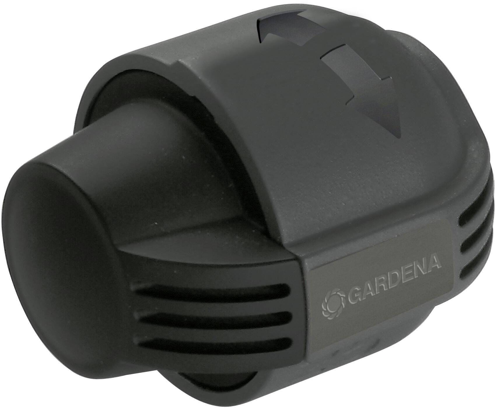 Black Gardena backflow preventer, with a one-way arrow indicating water flow direction. Essential for garden irrigation systems.