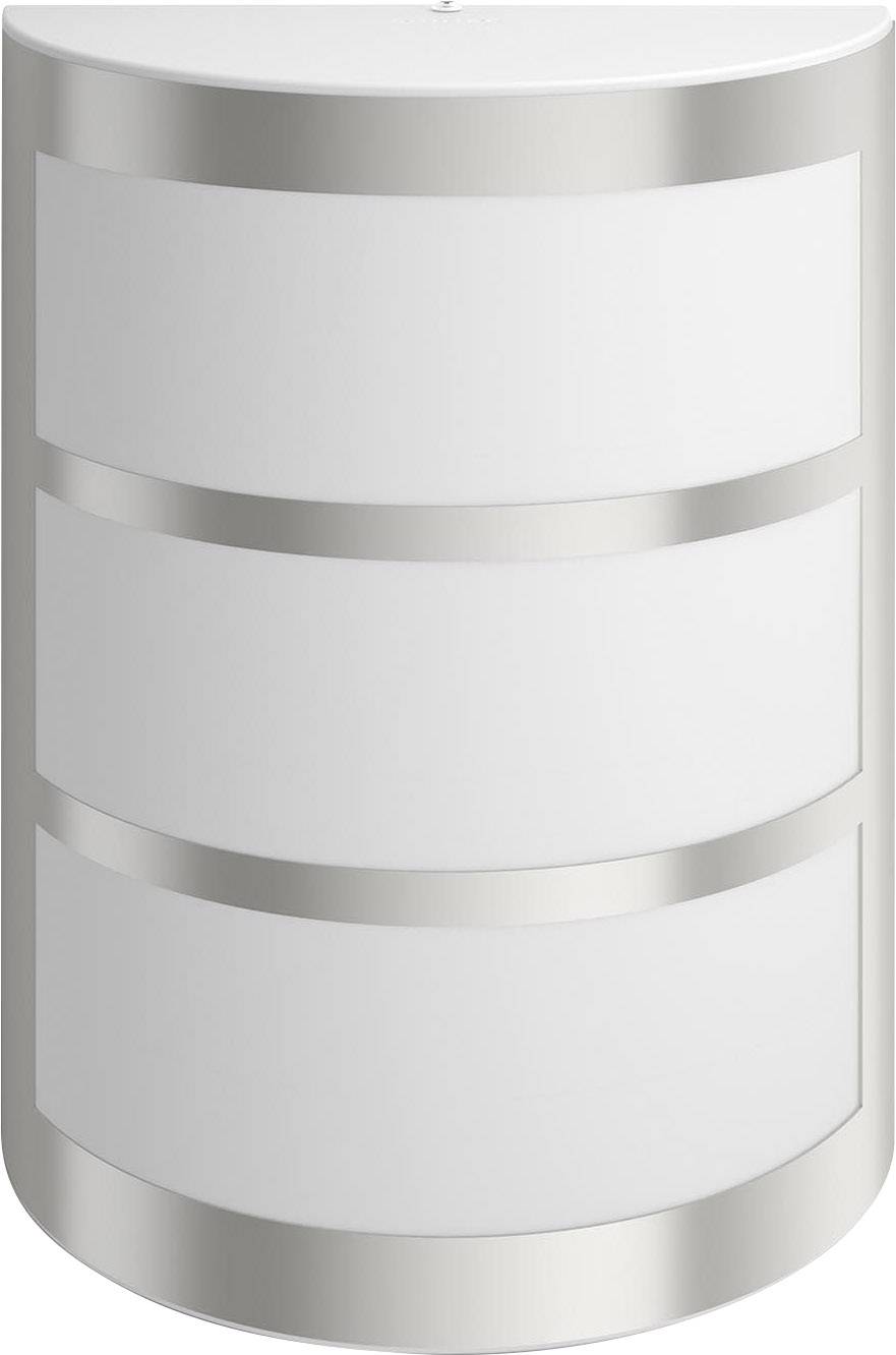A round, modern side table made of metal with three white shelves and silver accents.
