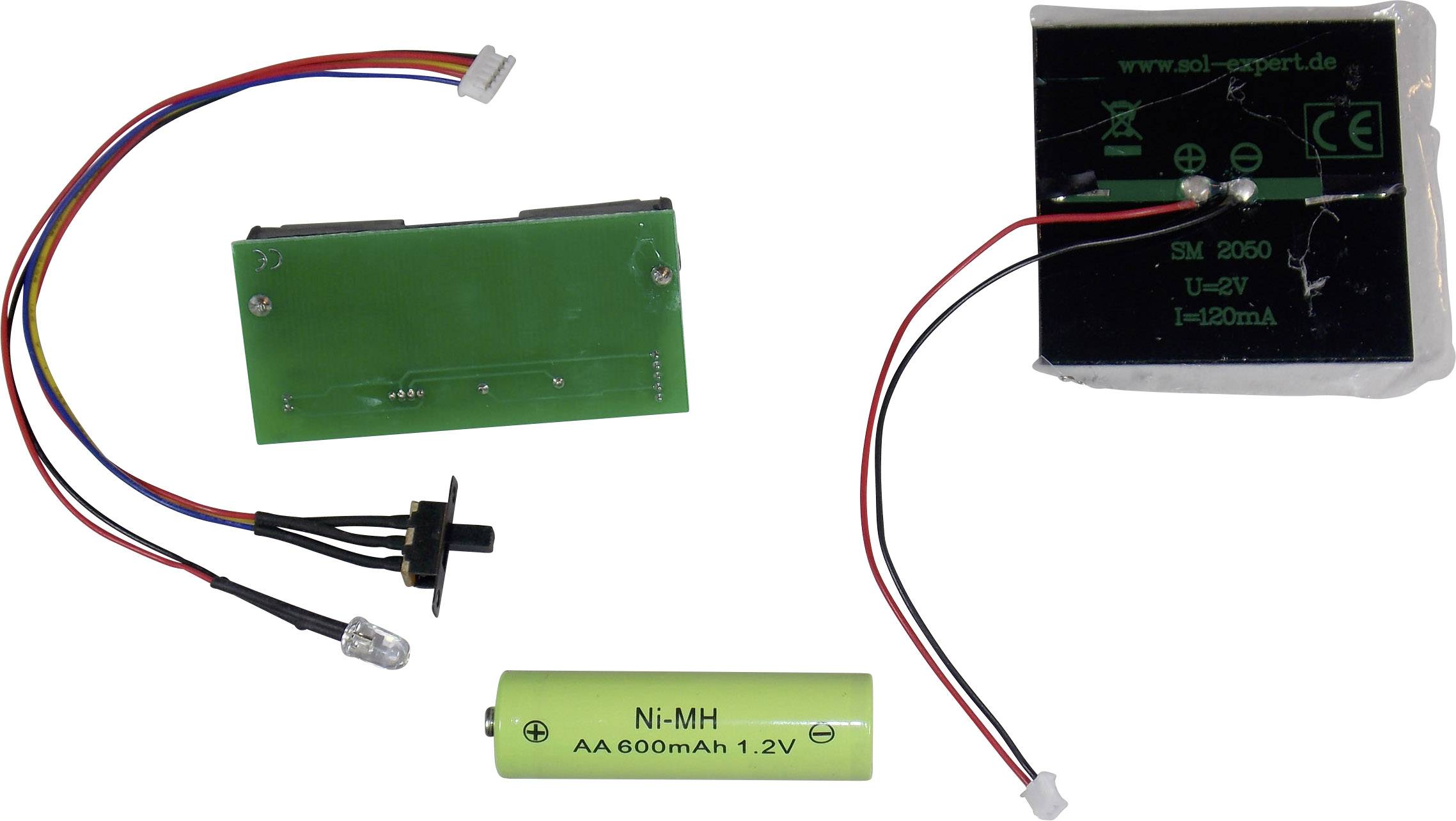 Electronic Components: A green circuit board with cables and connectors, a battery marked Ni-MH AA 600mAh 1.2V, and a small solar panel.