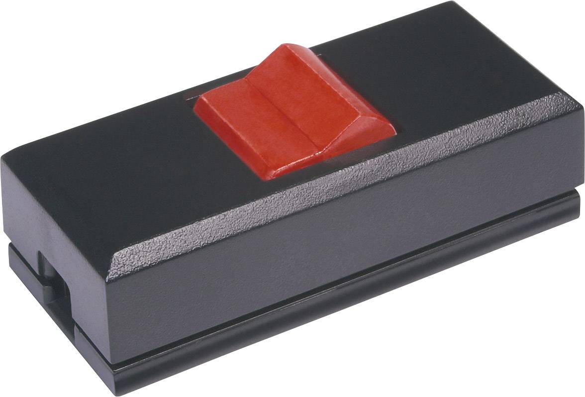 Black magnet with red handle in the centre, rectangular shape.