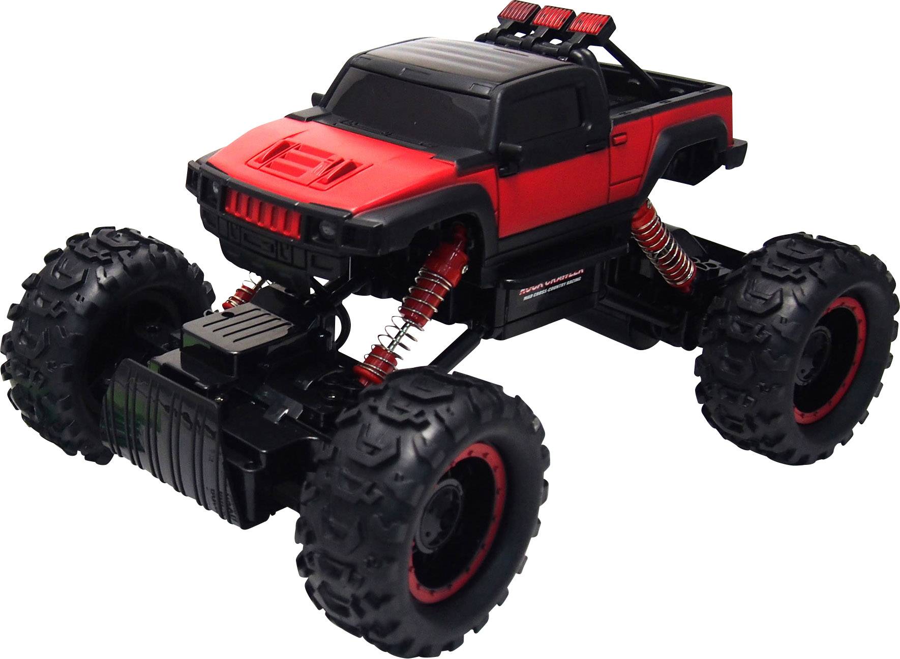 A red and black remote-controlled off-road vehicle with large, robust tyres and shock absorbers, ready for challenging terrain.