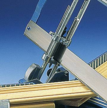 A blue steel saw cuts wood with a narrow saw blade for precise cuts.