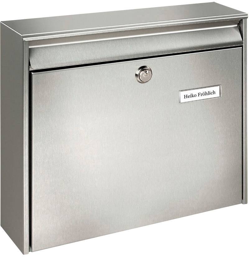 Silver stainless steel letterbox with a nameplate reading 'Heiko Fröhlich' and a lock on the front.