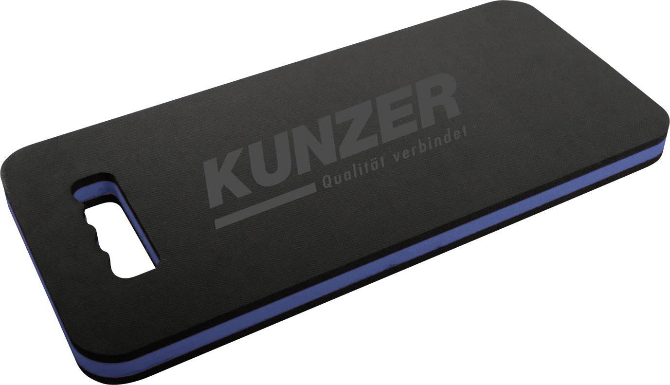 Rectangular, black knee pad with rounded corners and a grip opening. The inscription 'KUNZER' is visible on it.