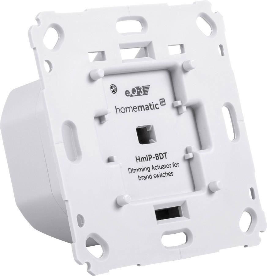 A white dimmer actuator for branded switches by Homematic IP, model HmIP-BDT. Suitable for mounting in wall sockets.