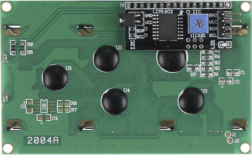 Electronic circuit board with a black module in the top right, which reads 'LCM1602'. Contains multiple contacts and components on a green background.