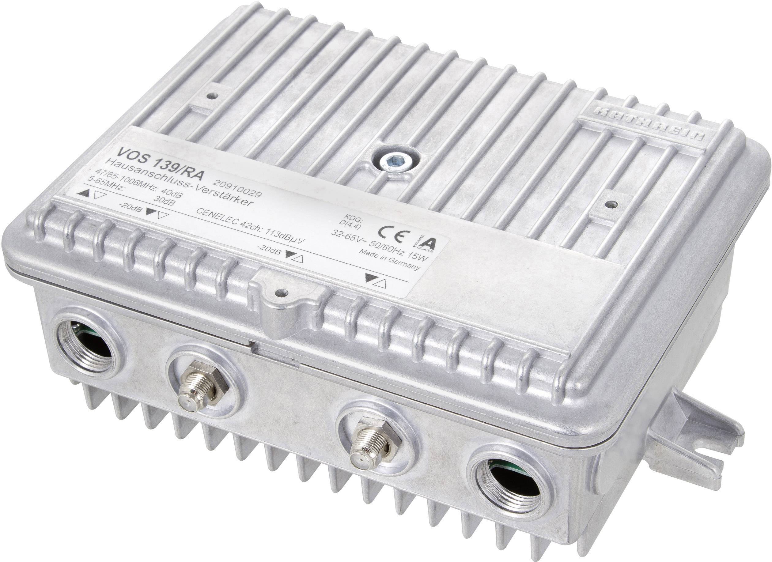 Electronic device in a metal casing with multiple sockets on the underside, possibly an amplifier or control unit.