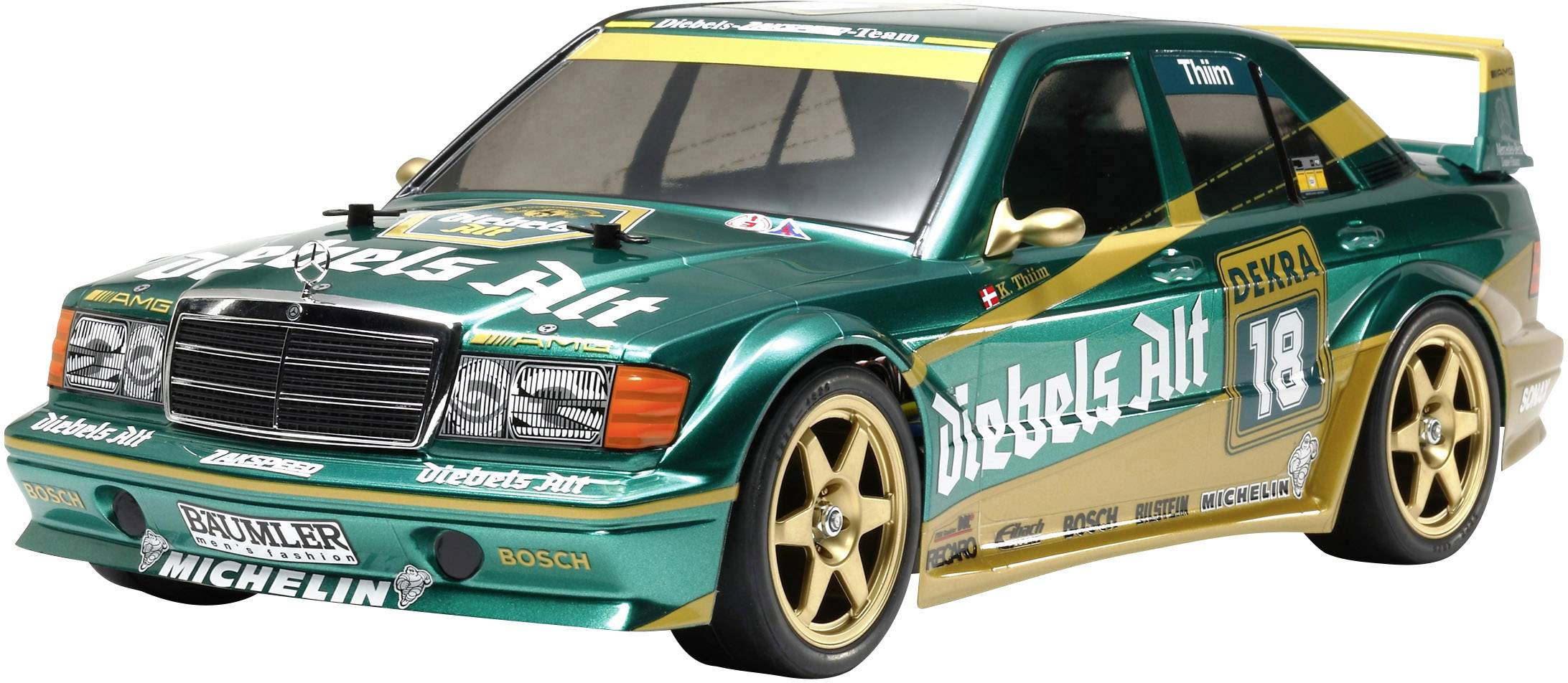 A green racing car model with the inscription 'Diebels Alt'. It bears the number 18 and is adorned with various sponsor logos.