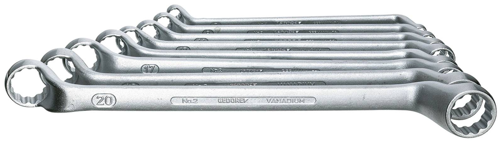 A set of eight ring spanners of varying sizes, arranged from small to large on a white surface.