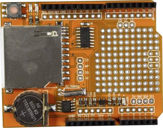 A microcontroller SD card expansion. Shows connections for data transfer and power supply. Developed for prototyping.