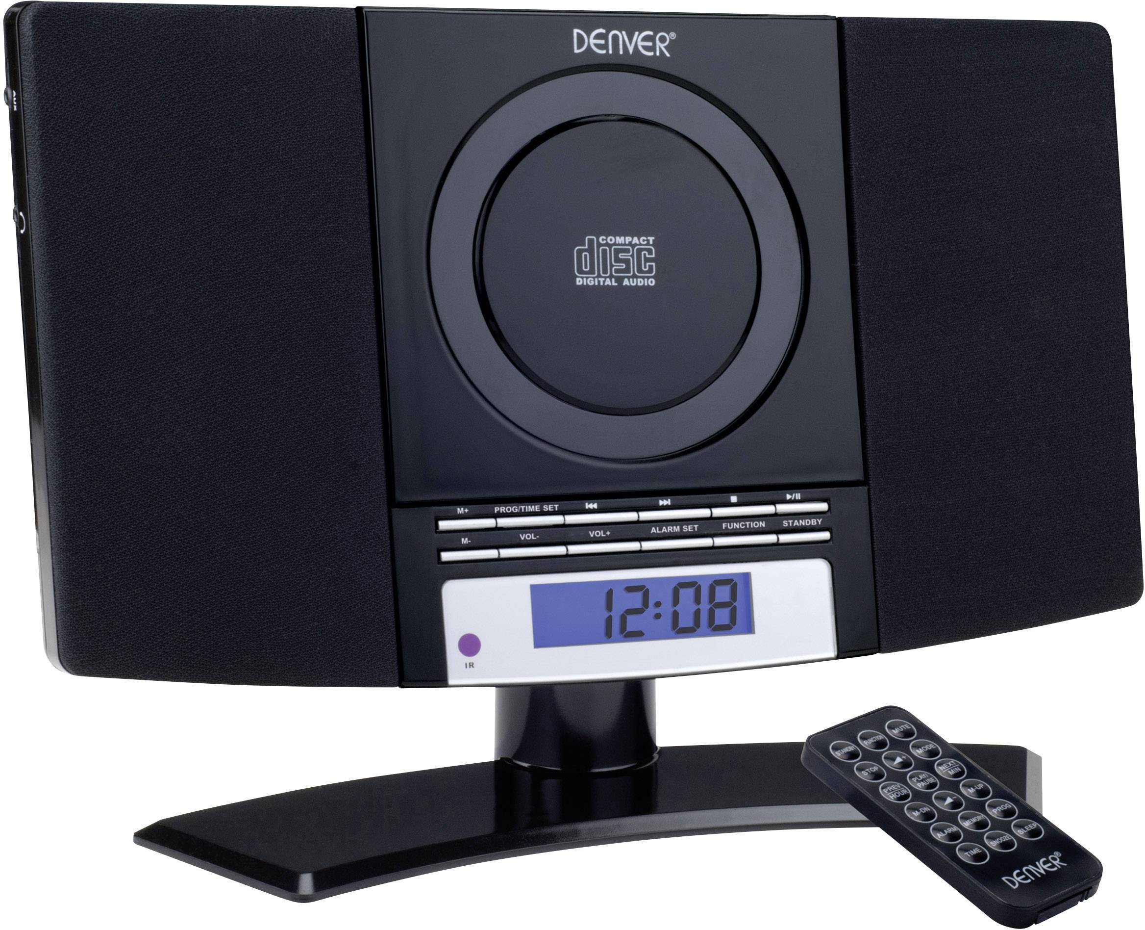 A compact stereo system with a CD player and digital display. A remote control is placed in front of it. Time on display: '12:08'.
