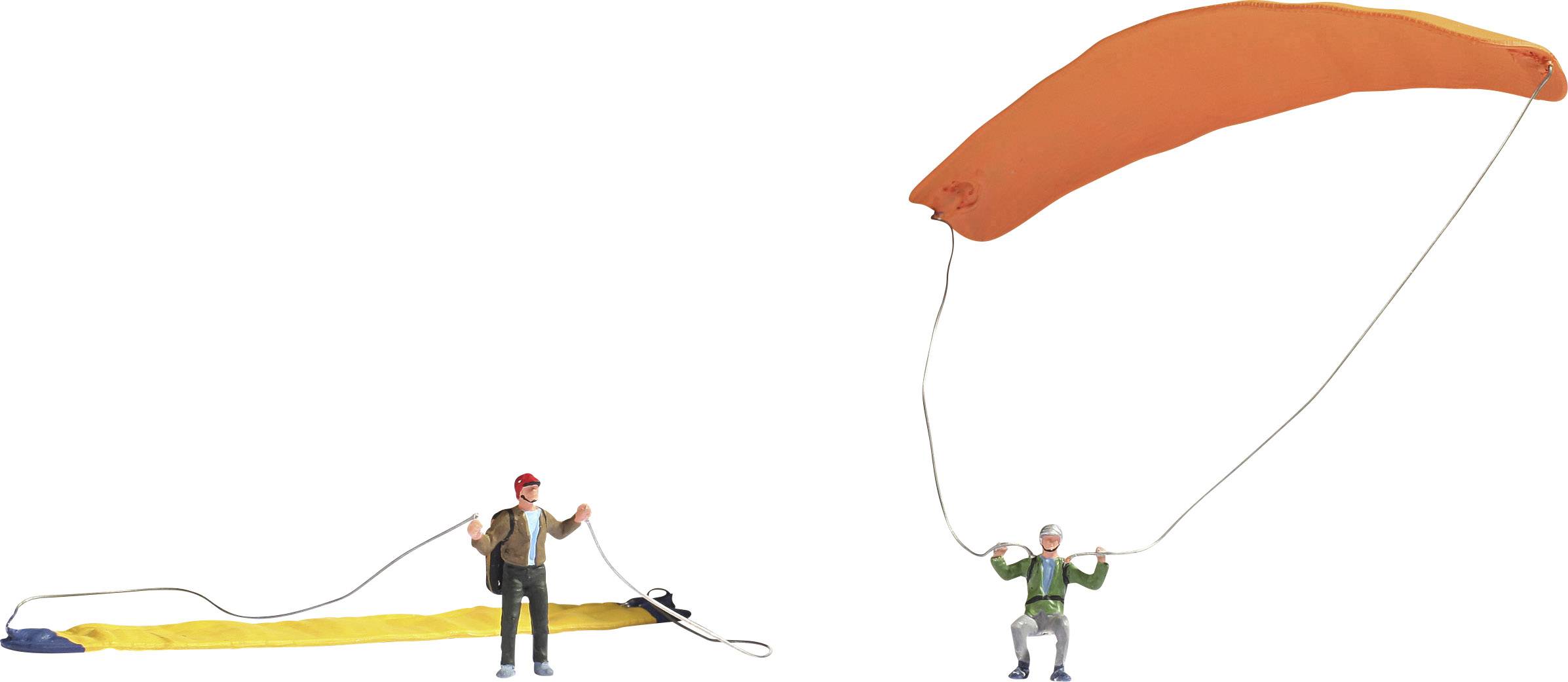 Two figures are holding lines of barrier tape that lie on the ground. The figure on the left is wearing a cap, the one on the right a jacket.