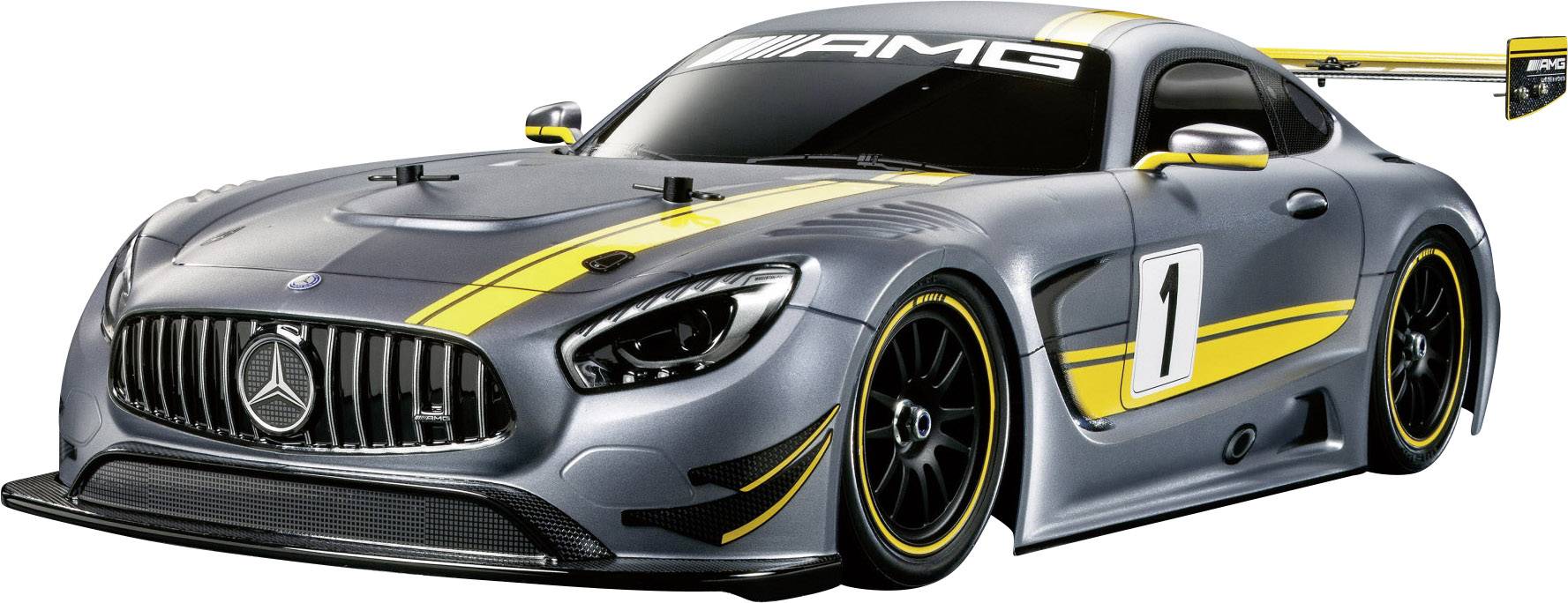 A silver racing car with yellow stripes and the number '1' on the side. The windows are tinted black and a large spoiler is mounted at the rear.