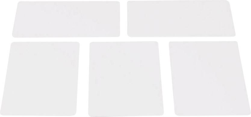 Five white, blank plastic cards in an upright arrangement.