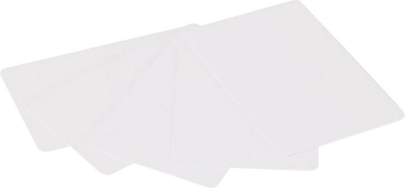 Five white, blank cards are laid out overlapping on a table.