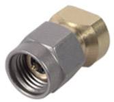 Two metallic connectors, one silver and one gold-coloured, lying side by side, showcase technical details and craftsmanship.