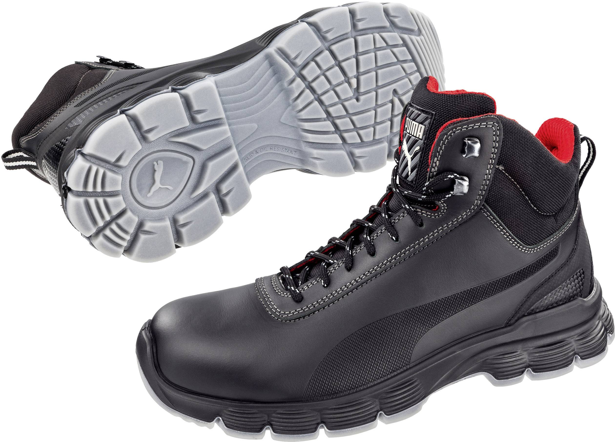 Black work shoes with grey, non-slip soles and red interior details, showing side and bottom profile.