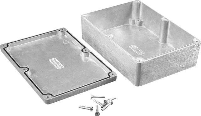 Aluminium enclosure with lid removed, interior side visible. Six screws are laid out in front, ready for fastening.