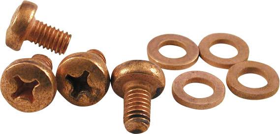 Three copper screws and four copper rings are lying on a surface.
