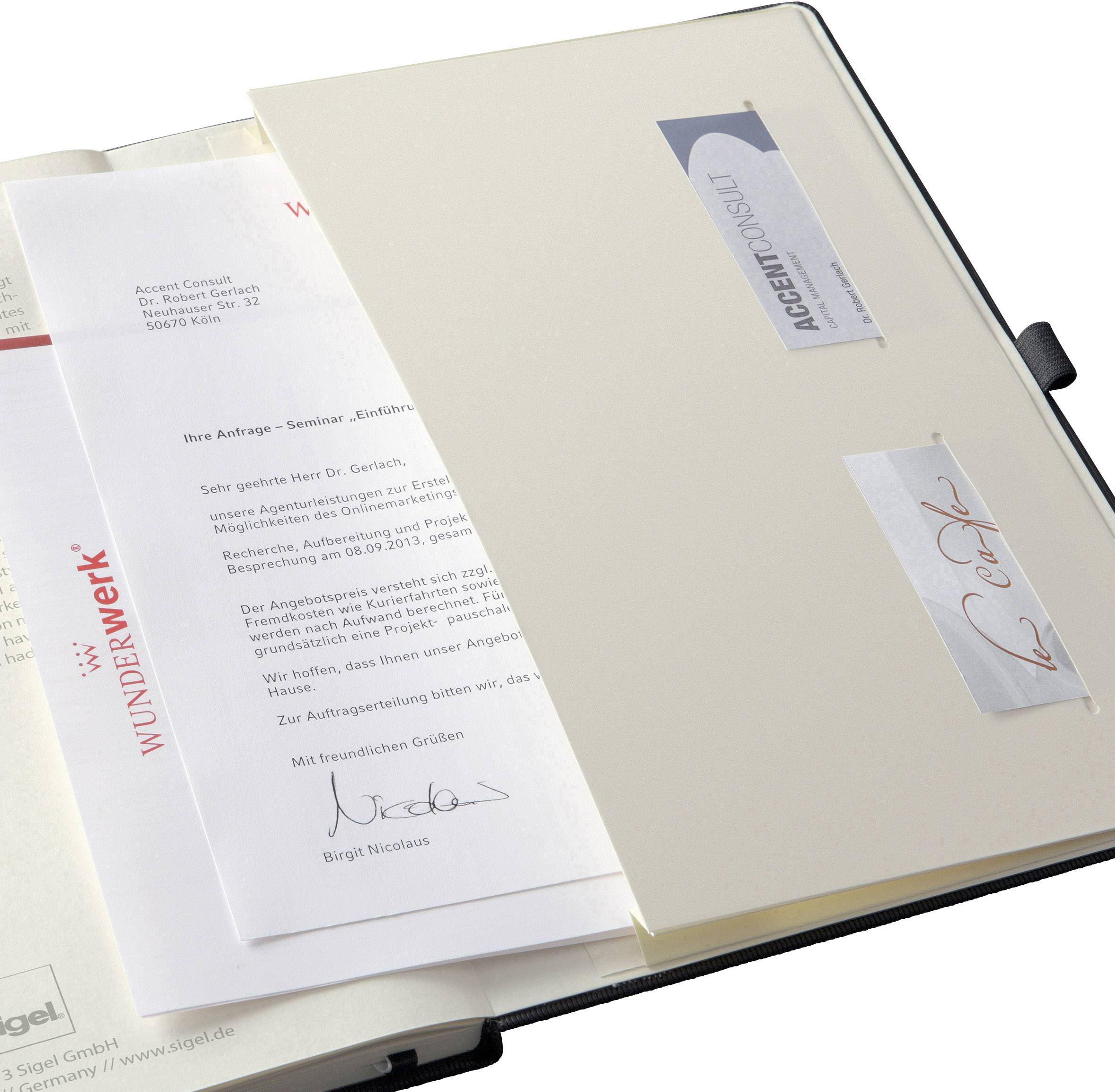 An open folder with documents. Visible are a letterhead with the logo 'WUNDERWERK' and a document from 'Accent Consult'.