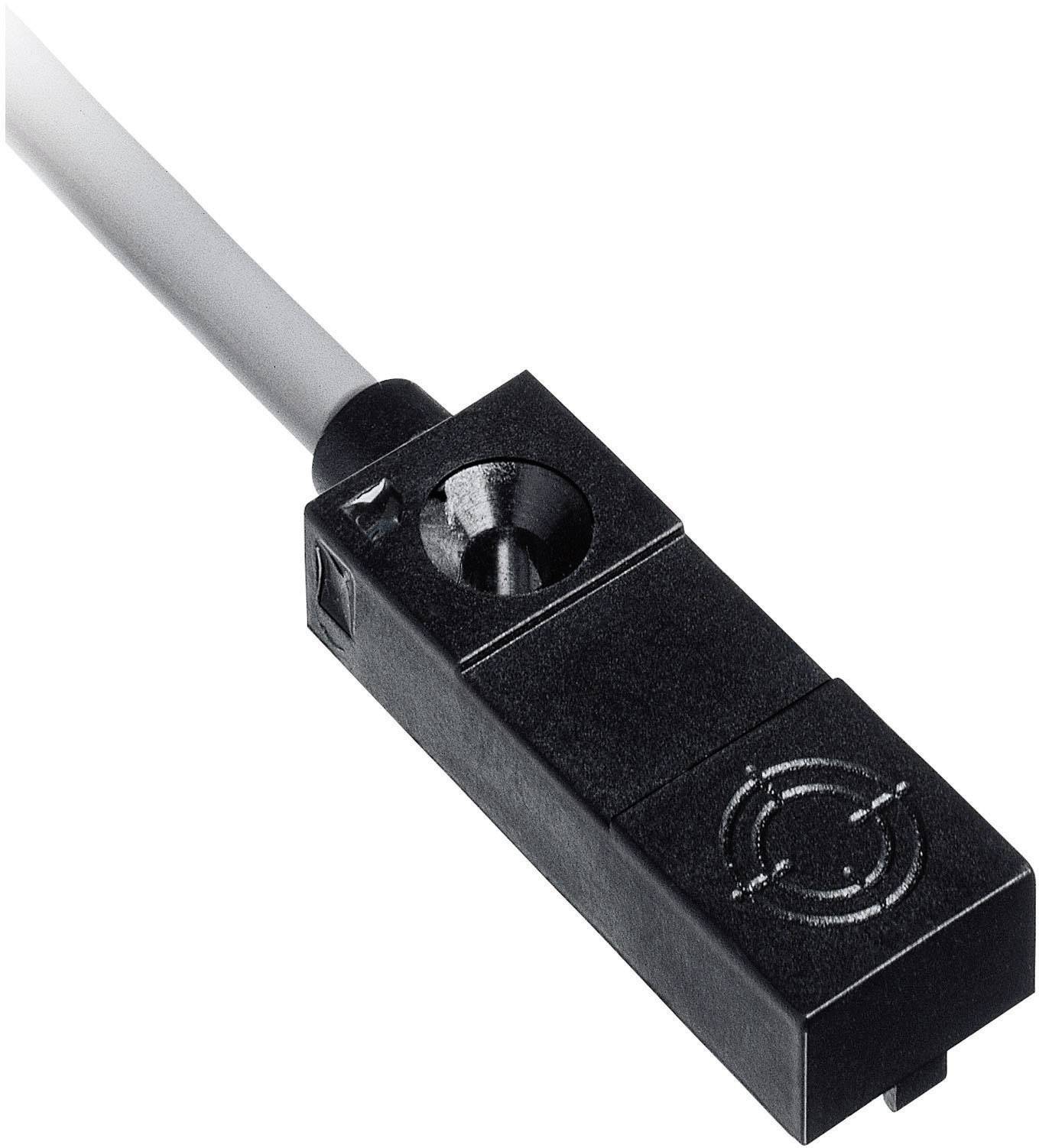 A black proximity sensor with a white connection cable, suitable for industrial applications and precise positioning.