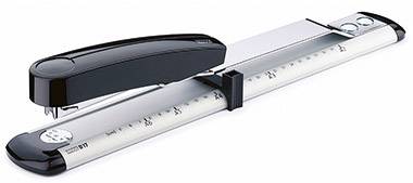 A flat, horizontal hole punch and stapler combined, with a black and silver design; suitable for office or school.