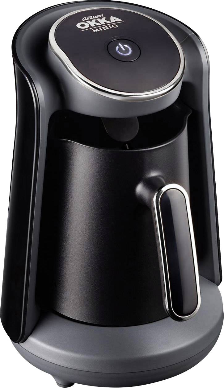 Electric coffee machine with a black casing and silver handle. A power button is located on the top.