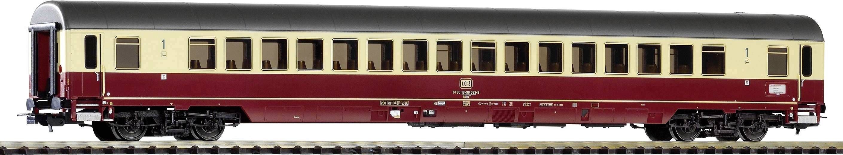 A red and cream-coloured passenger carriage of the Deutsche Reichsbahn. The model shows details such as windows and lettering.
