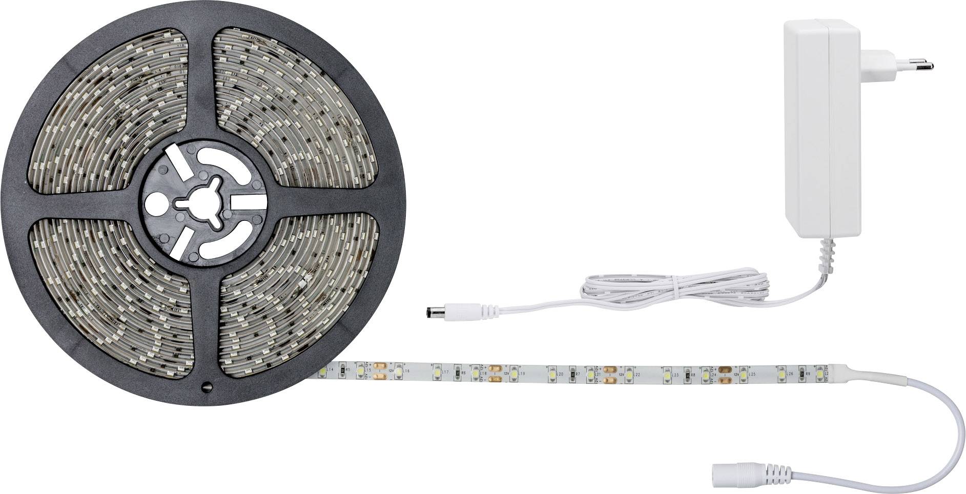 LED light strip on a reel with a plug-in power supply, unrolled segment showing colourful LEDs. Ideal for decorative lighting.