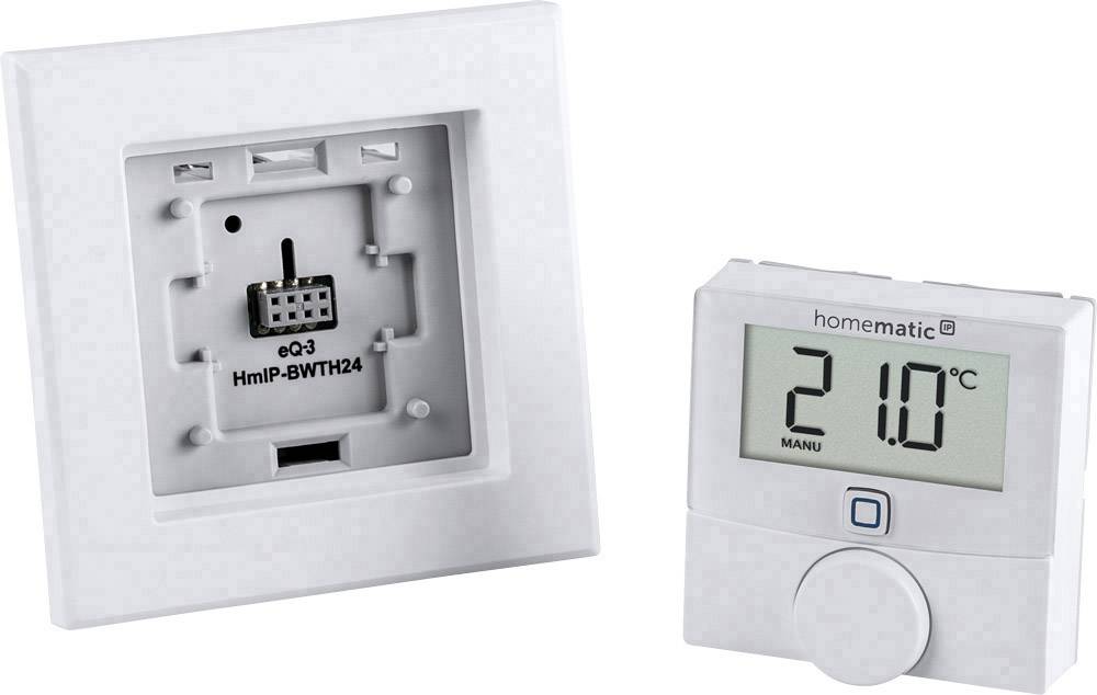 A digital display thermostat shows '21.0°C'. Beside it is an empty, square wall mounting bracket for installation.