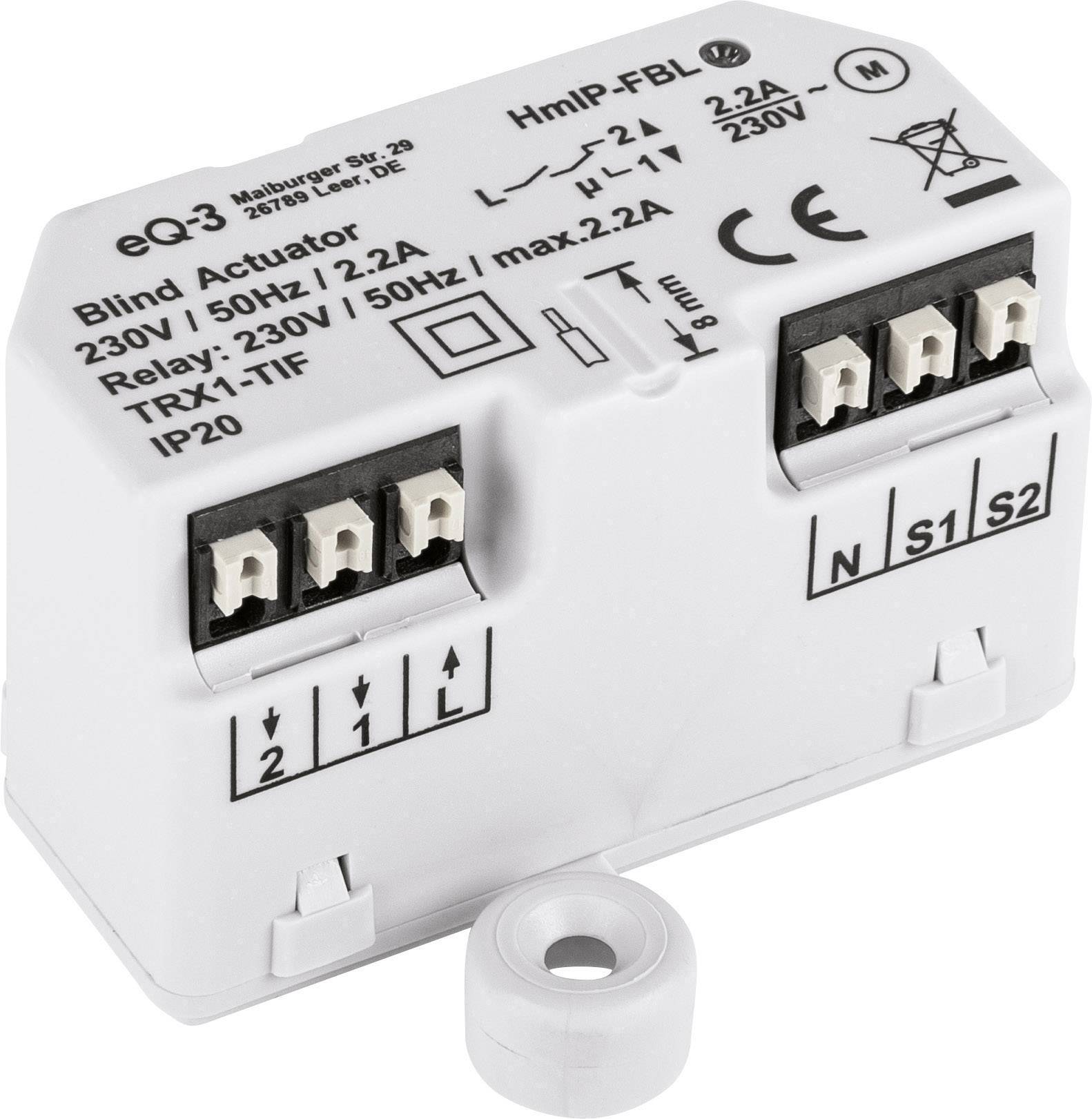White blind/shutter actuator for smart home systems, identifiable by technical labelling and connections on the top surface.