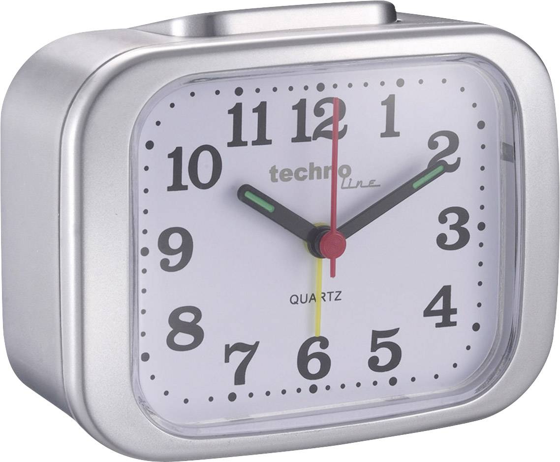 A silver alarm clock shows 11:05. It has a white dial with black numbers and colourful hands.