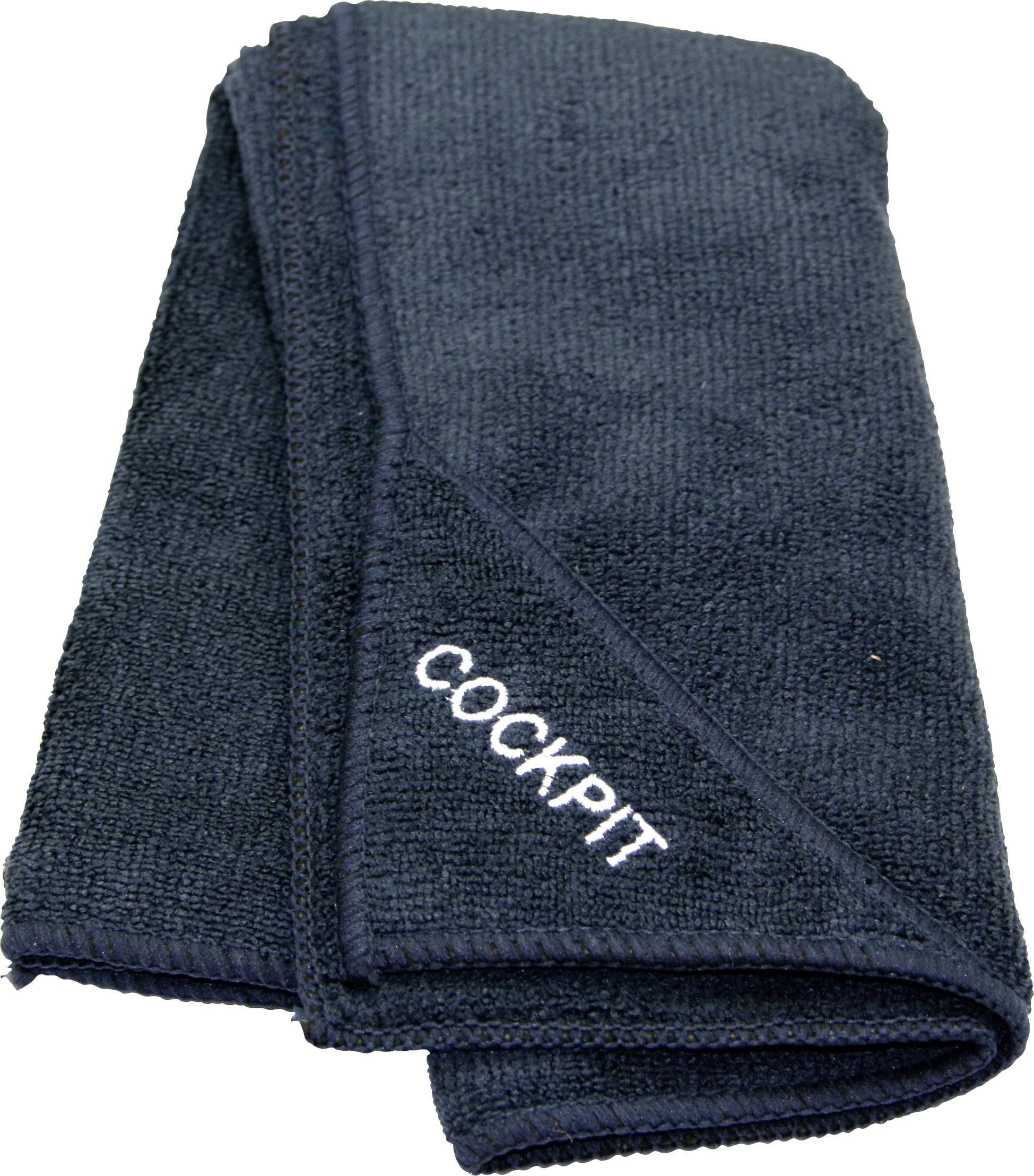 A navy blue microfibre cloth with the print 'COCKPIT', folded and ready for cleaning automotive parts.