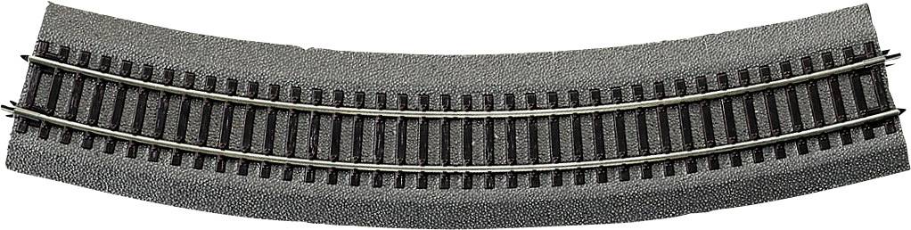 A curved model railway track piece made of metal and plastic on a grey background.