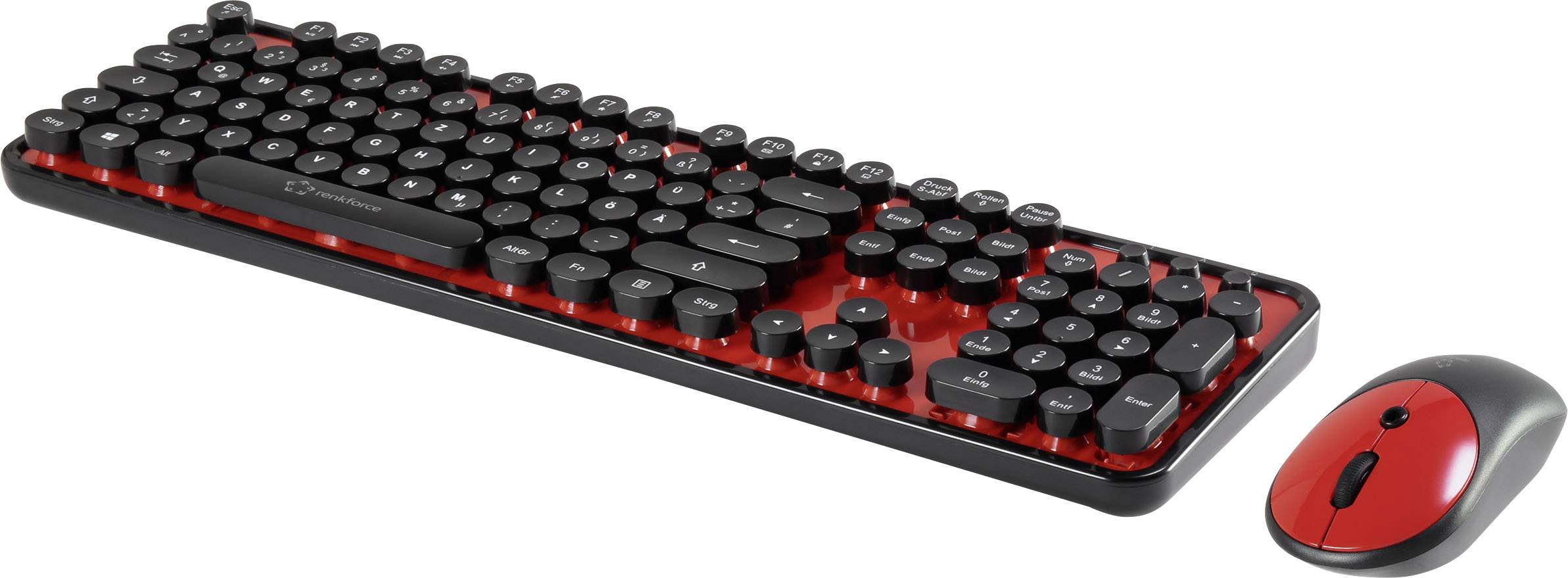 Black mechanical keyboard with round keys on a red background, next to a red and black wireless mouse.
