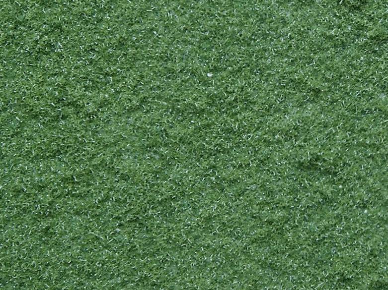 Area covered with dense, green artificial turf, textured and evenly distributed.