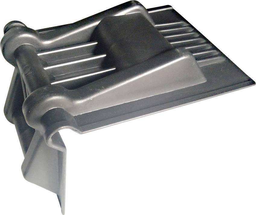A black plastic component with multiple grooves and two raised sections, likely a machine part or component.