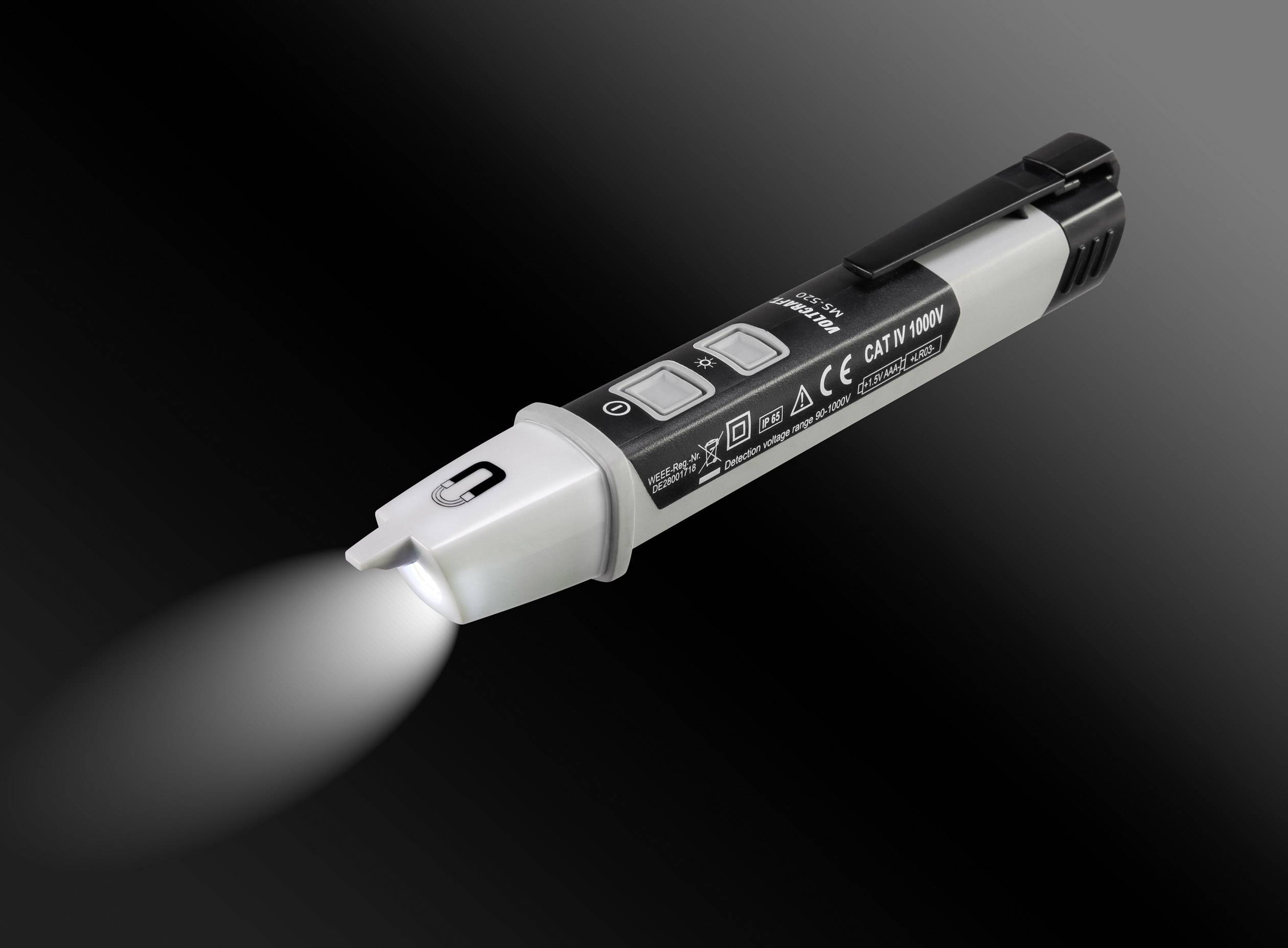 A non-contact voltage tester with torch, black casing, lights up, indicates readiness for electrical safety measurements.