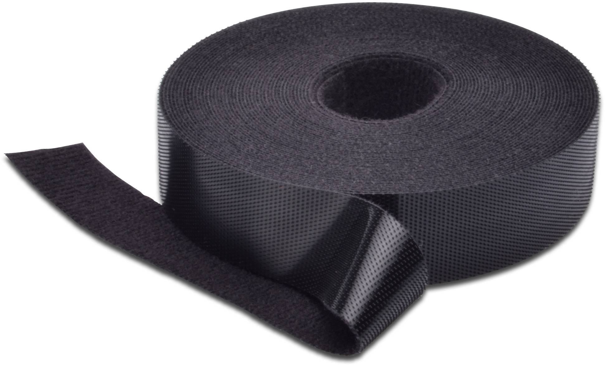 A roll of black hook-and-loop tape, partially unrolled, rests on a surface.
