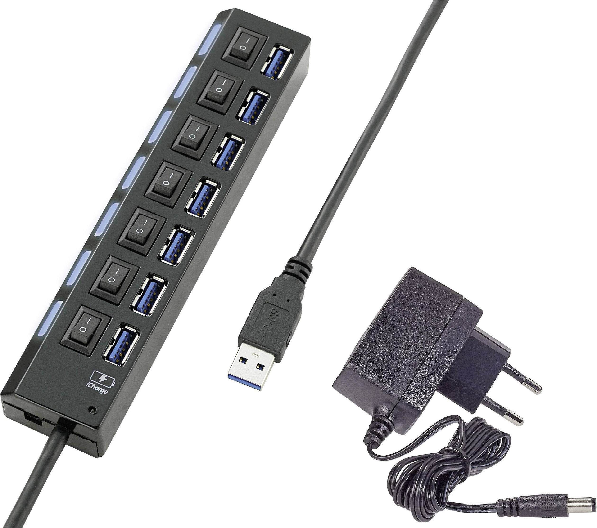 A USB hub with seven ports and on/off switches beside each port, including power cable and power adapter.