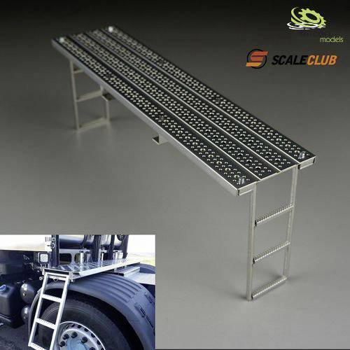 Steel ramp with lattice structure and foldable ladder for mounting on vehicles, shown in miniature model. Used as a loading aid.