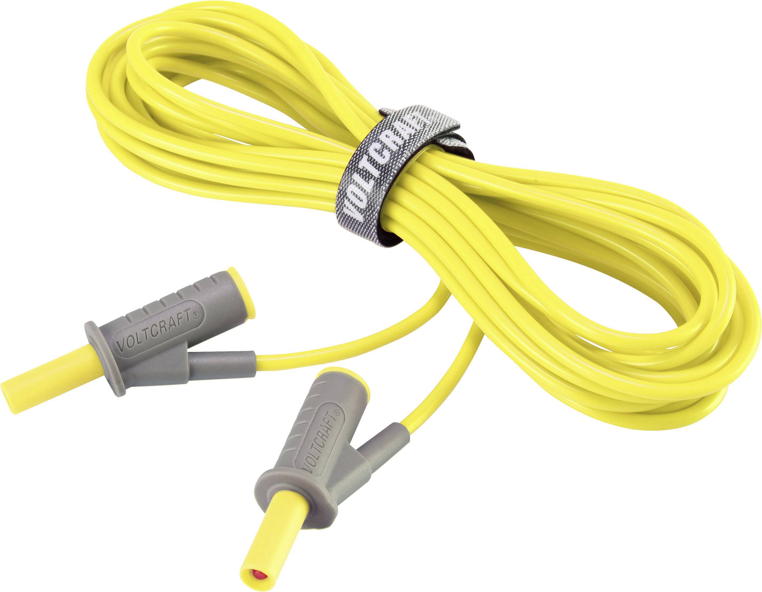 Yellow cable with two grey plugs and the inscription 'Voltcraft' secured by a cable tie.