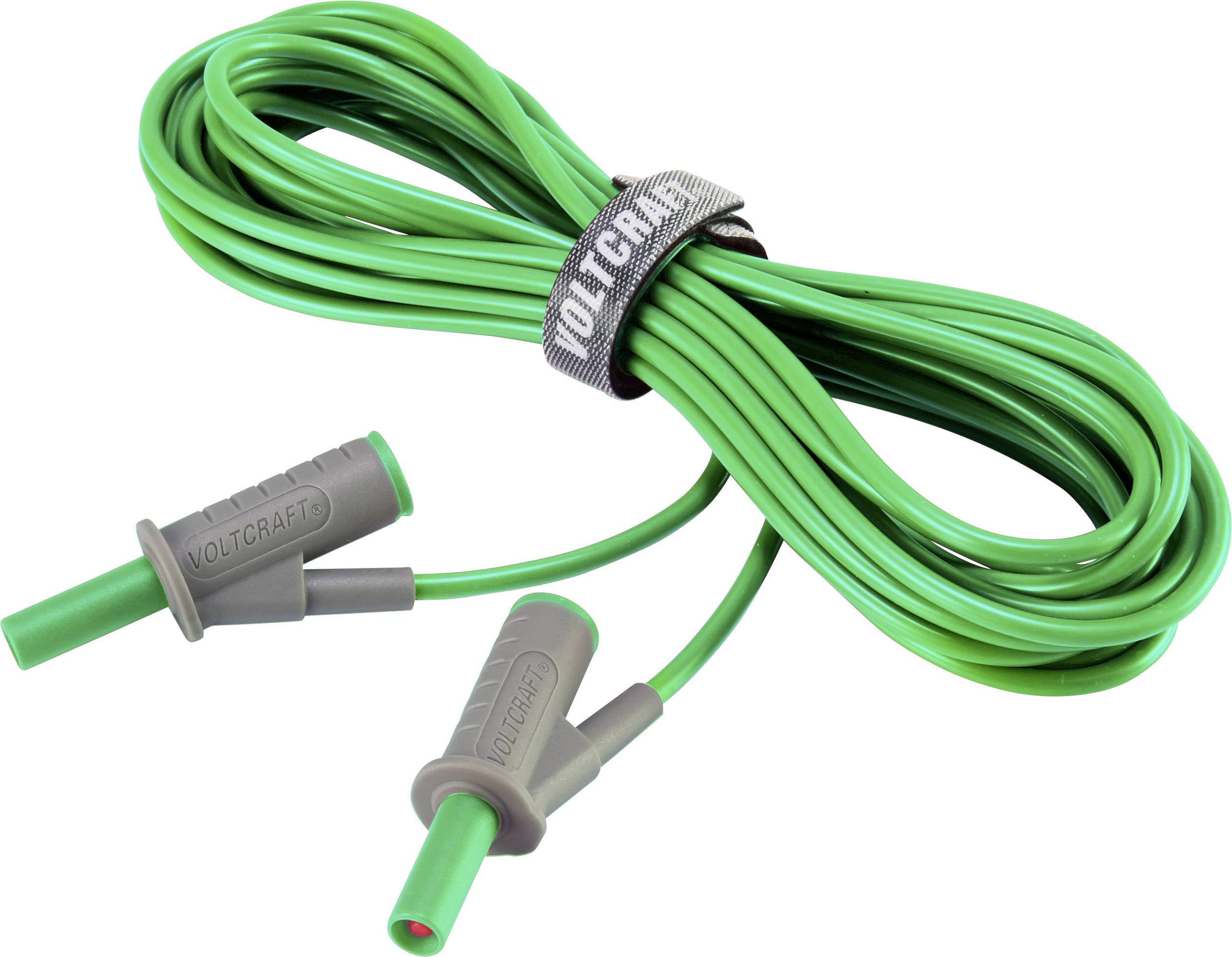 Green Volcraft cable with two connectors, coiled and secured with a hook-and-loop fastener. For electrical applications.