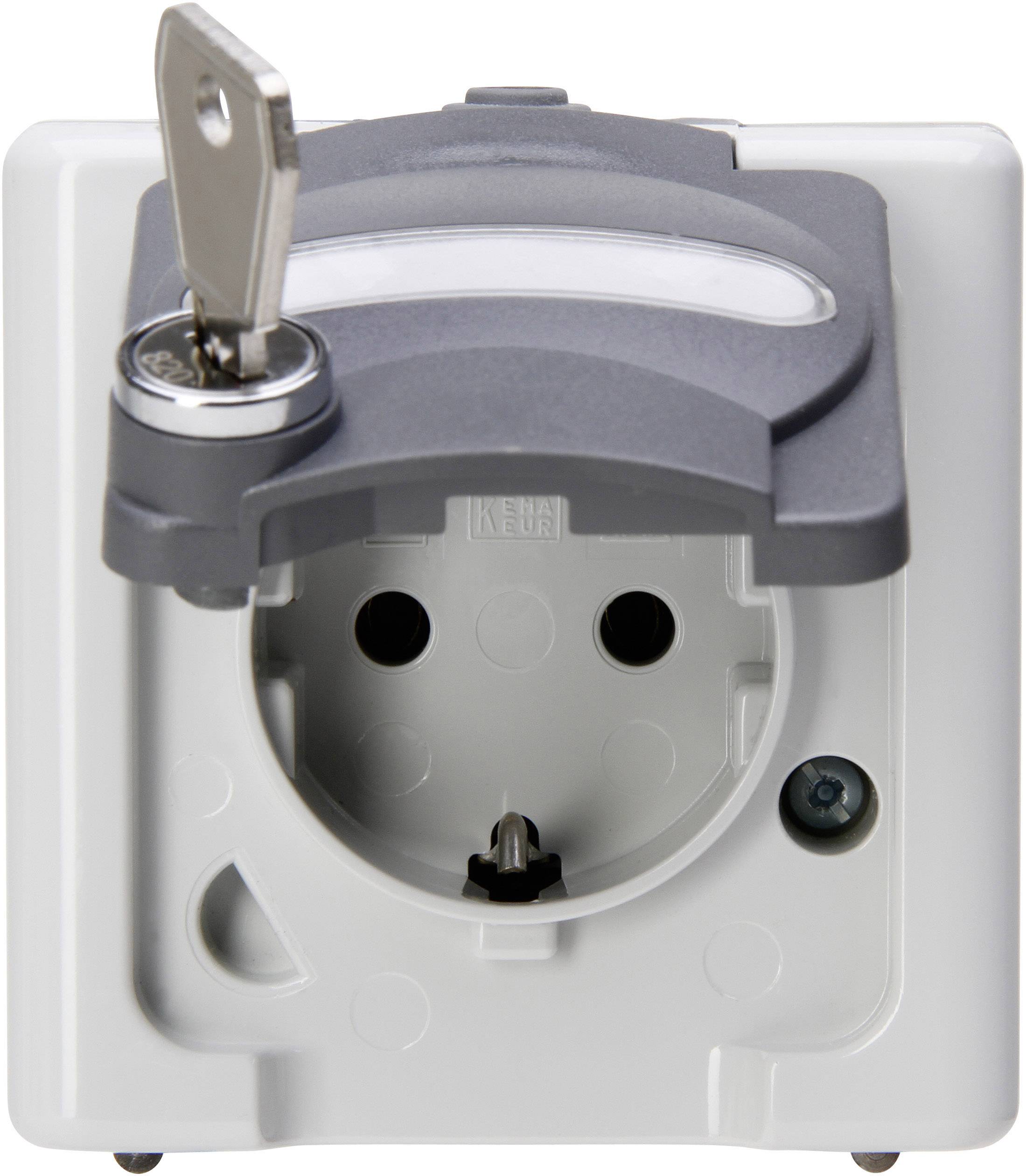 A grey, lockable outdoor socket with a protective cover. A key is inserted in the lock that secures the cover.