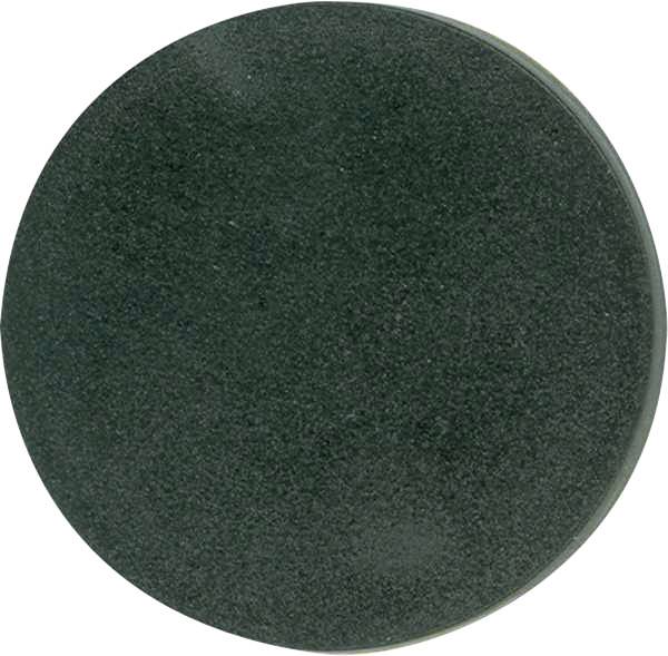 Dark green, circular grinding stone made of coarse material, typical for metalworking.