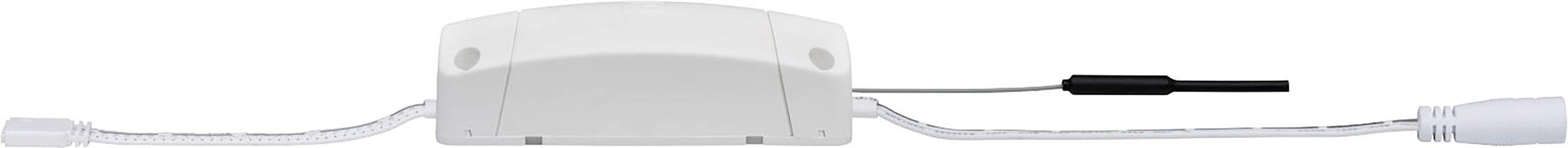 A white electrical device with cables at both ends. On the left a plug, on the right a black casing.